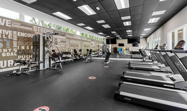 fitness center with exercise equipment