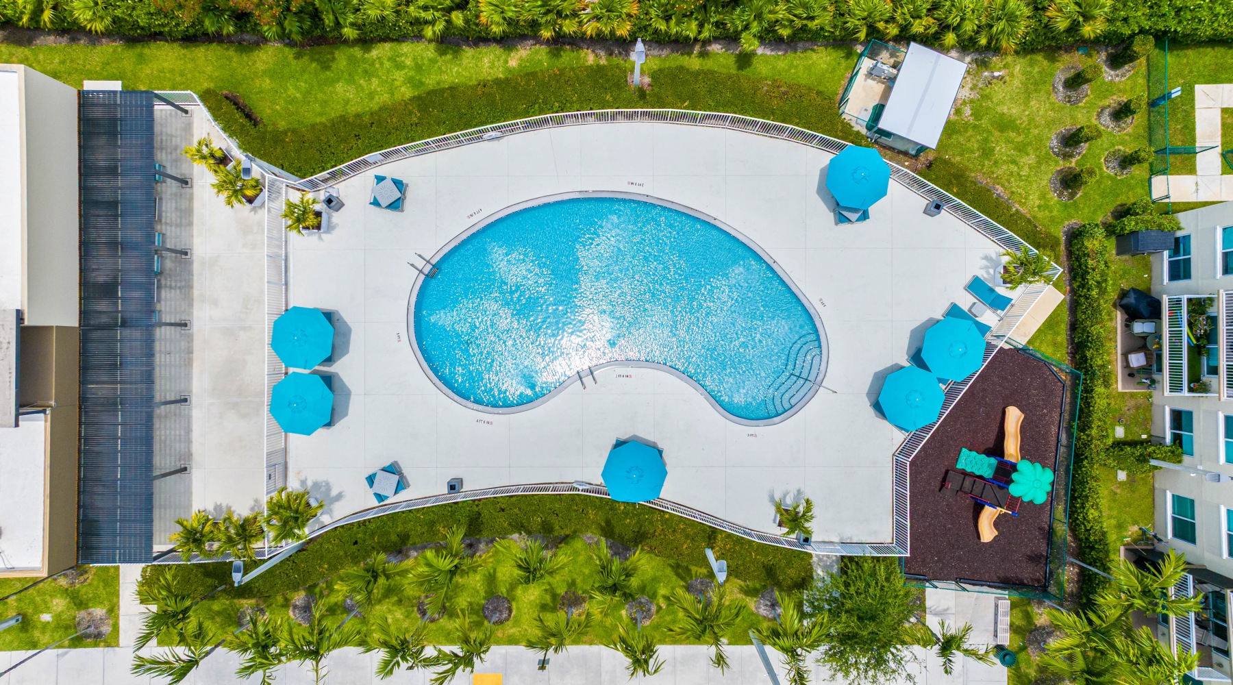 aerial view of a pool in a courtyard