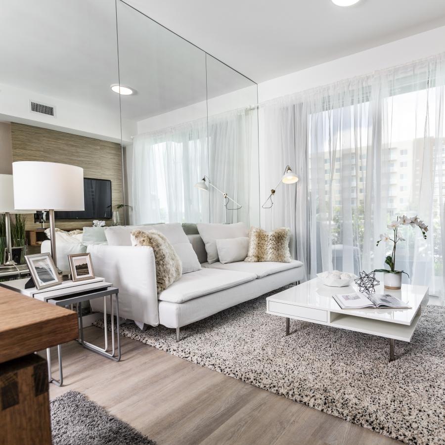 a living room with a couch and a table