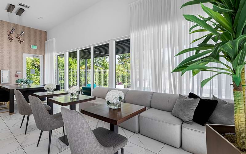 room with many tables and chairs